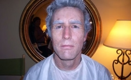 young man wearing old man makeup