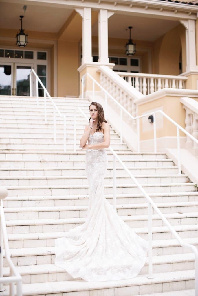 Bride posing on outdoor staircase