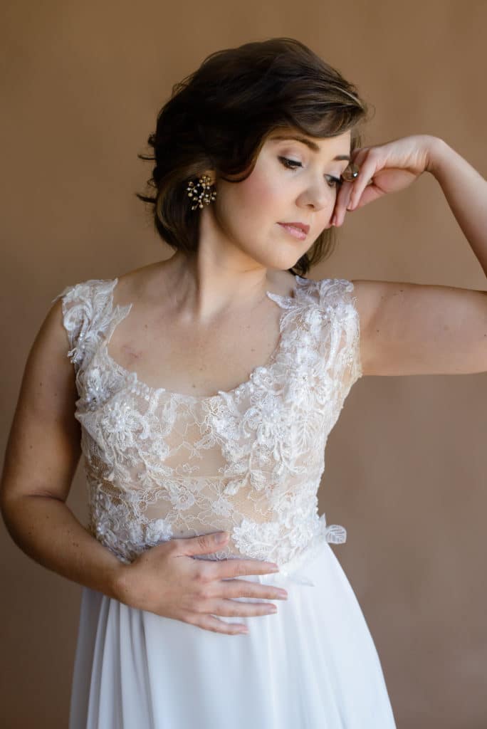 Bride posing in her dress