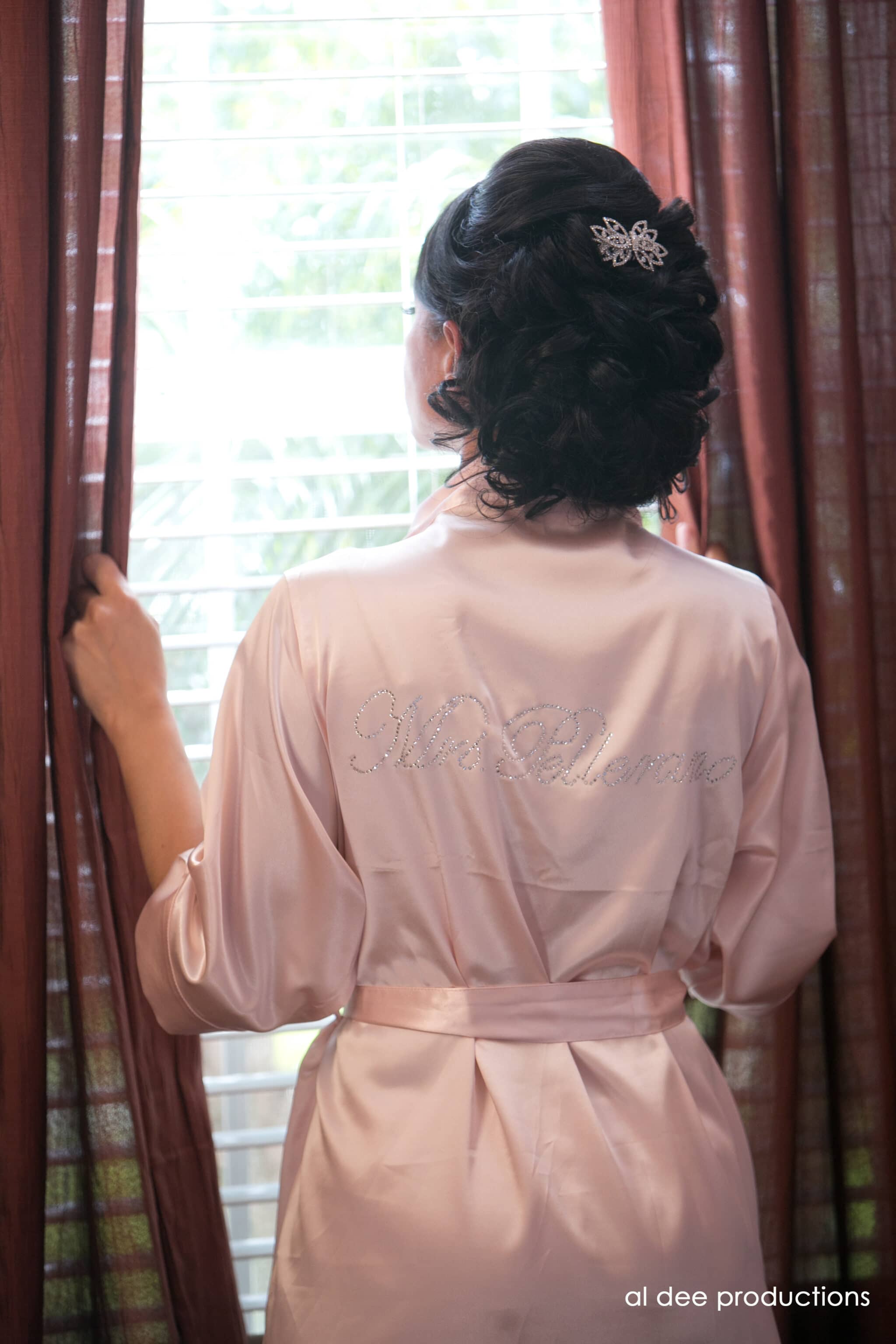 Back view of bride looking out window