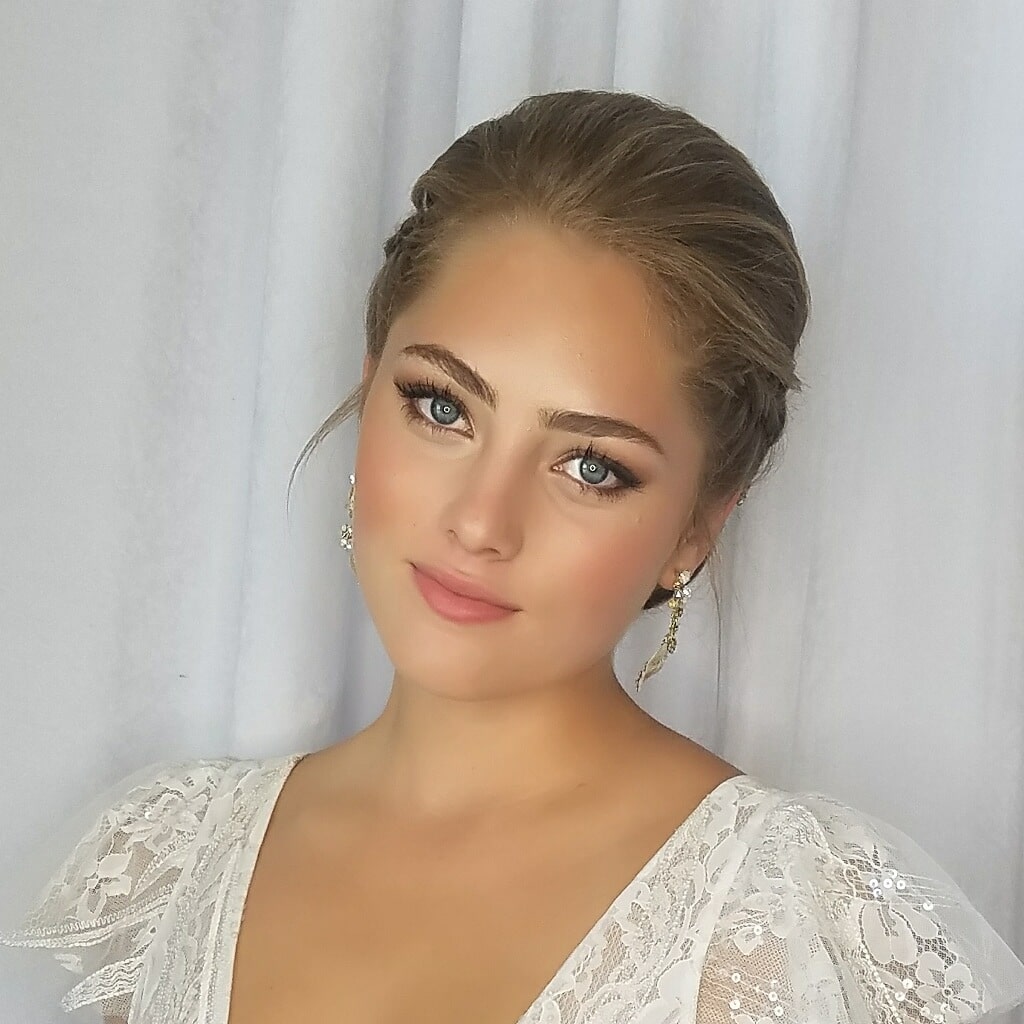 Model in bridal gown and makeup
