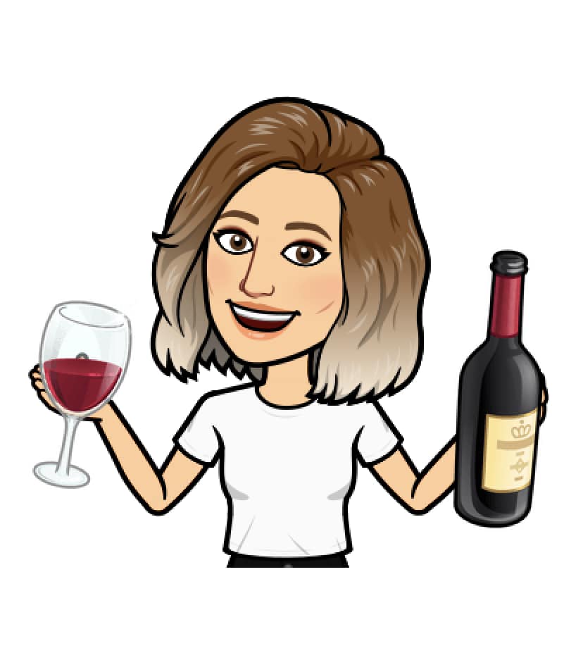 Emoticon of woman drinking wine