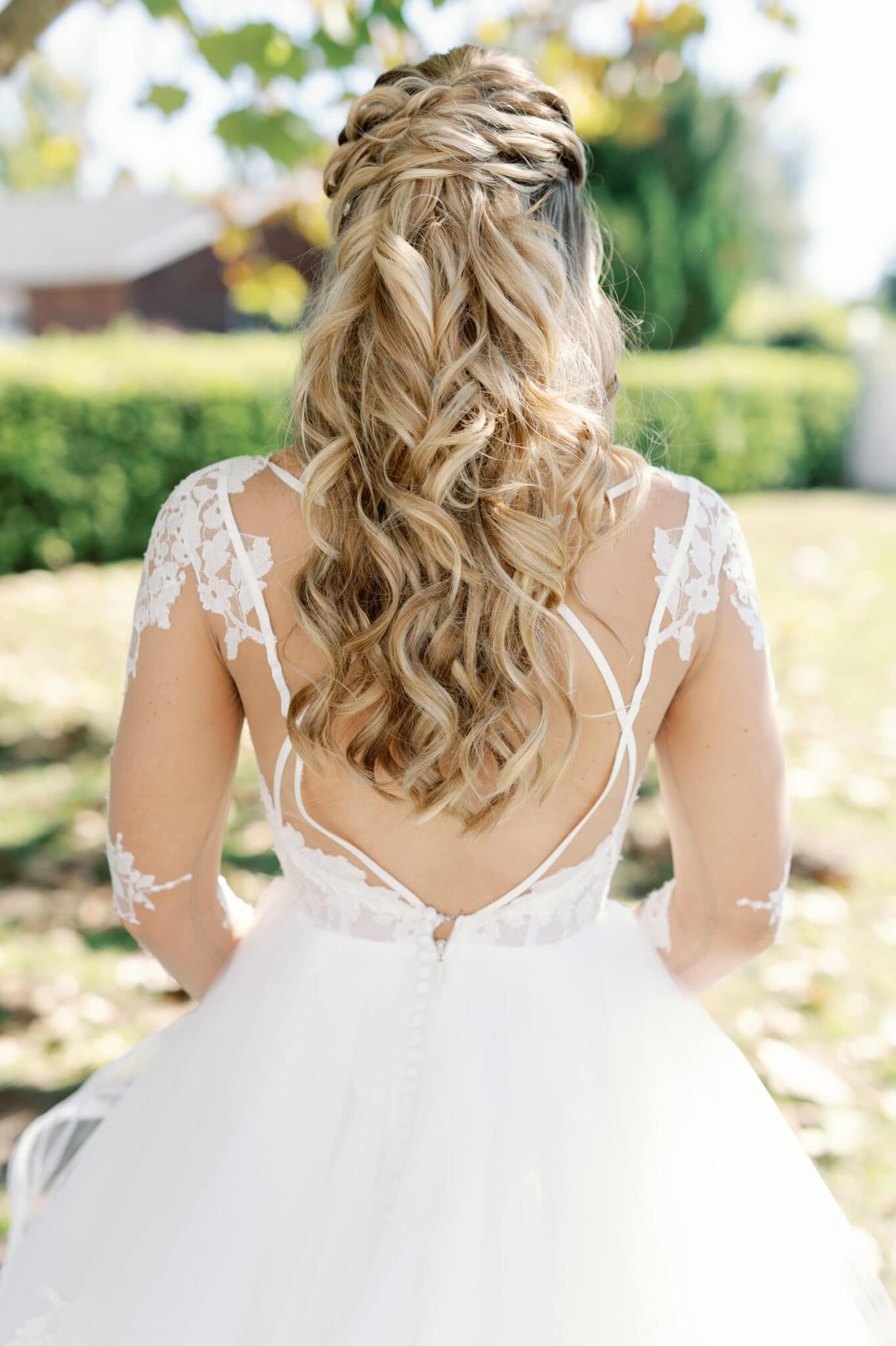 Back of brides' dress and hairstyle