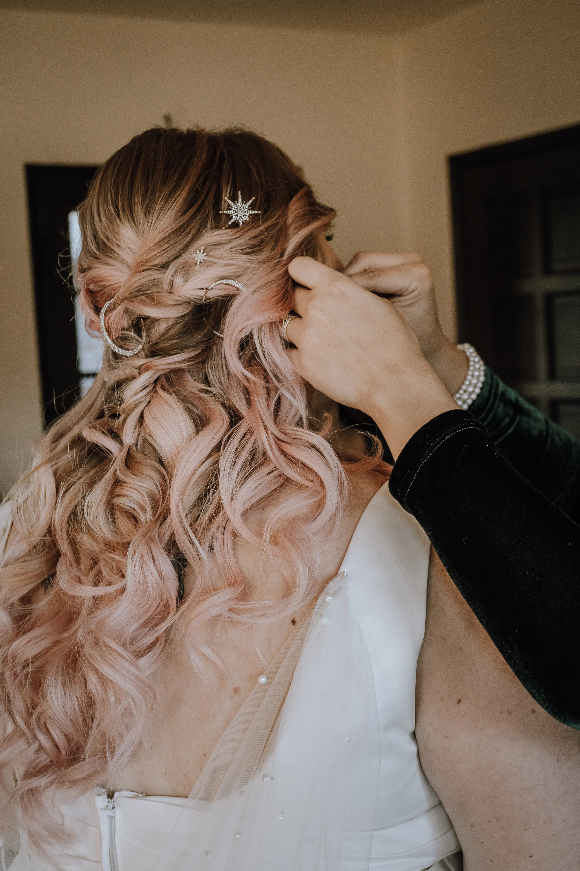 bridal hair styling half up curls orlando wedding m3 beauty - Wedding Makeup and Hair Gallery Bridal hair styling session showing elegant half-up wedding hairstyle with loose curls and sparkly hair accessories by M3 Beauty wedding hair and makeup company in Orlando Florida